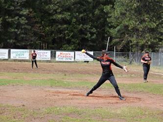 softball player pitching