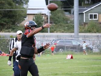 football player throwing the ball