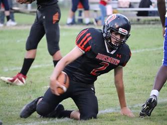 football player down with the ball