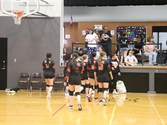 Volleyball team huddle