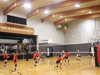 Volleyball players watching the ball