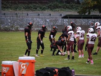 football players huddle