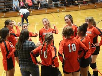 volleyball team huddle